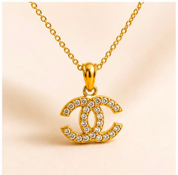 Everyday Chanel 22k Gold Pendant Set